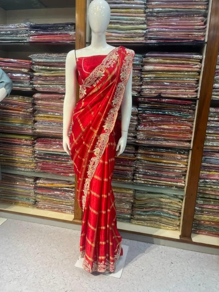 Red handwork saree at the store
